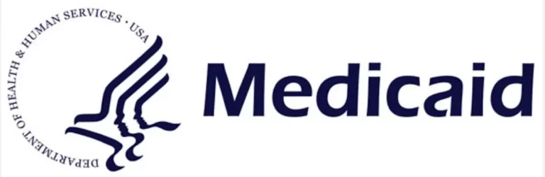 The image features the logo of Medicaid. It includes the silhouette of a bird with human profiles in its wing, encircled by the words Department of Health & Human Services, USA next to the word Medicaid in bold letters.